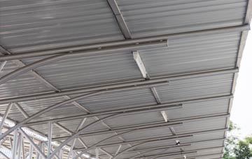 installing The Bourne metal roofing